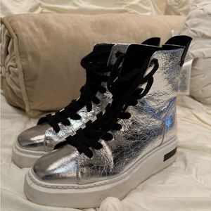 Women’s Calvin Klein metallic silver space boots. Size 7